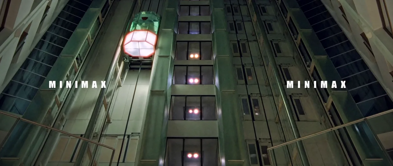 Upward view inside a tall industrial lift shaft with illuminated elevator cars